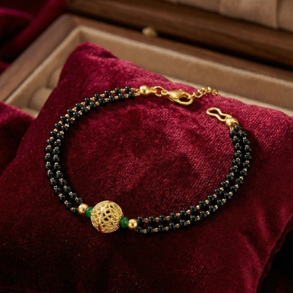 Luxury Double-Strand Black Bead Bracelet with Gold Center Charm