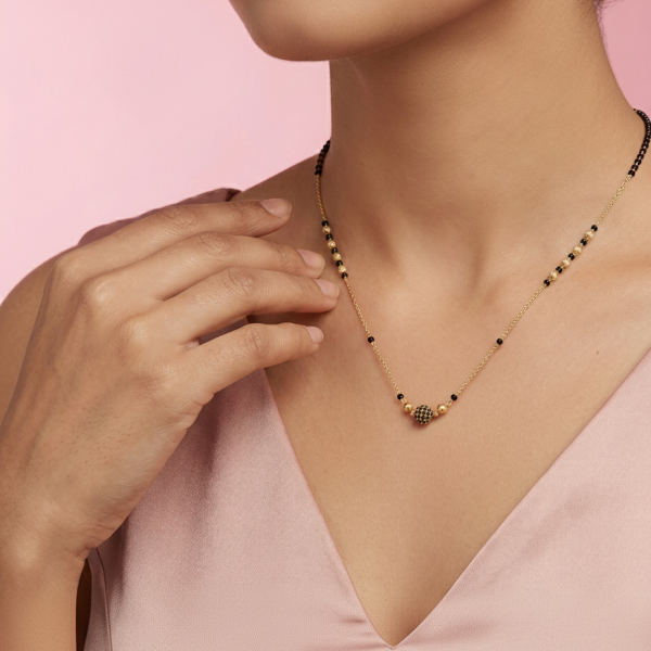 Elegant Black Bead Mangalsutra with Designer Gold Pendant